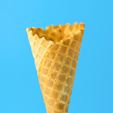 Ice-cream cone on a light blue background